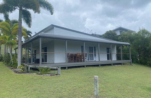 Orchid Beach House | Ques R & R at Orchid Beach. Water views with sea breeze. Relaxing Holiday House.