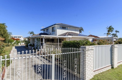 Sandstone Point House | Relax & Unwind: Poolside Paradise
