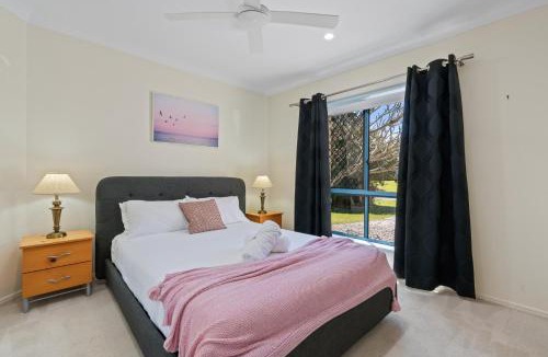 Banksia Beach House | Relaxation & Space in a Canal Home