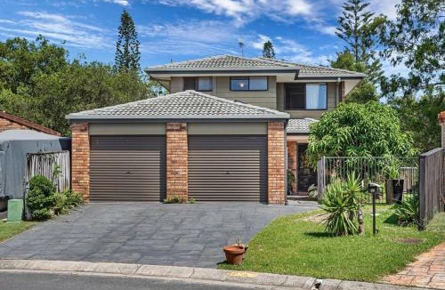 Elanora House | Riverfront Oasis in Elanora