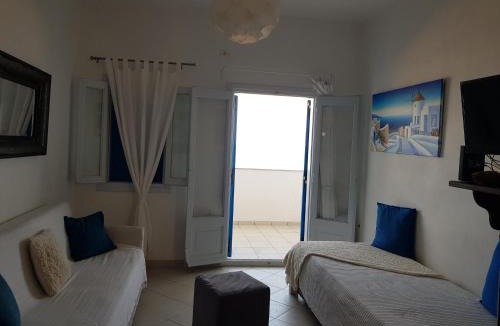 Monolithos Apartment | Rodothea and Adams on the Beach, Santorini