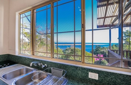 Seventeen Seventy Apartment | Seaview - Charming Two-Bedroom Home with Stunning Views of the Historic Bay of 1770