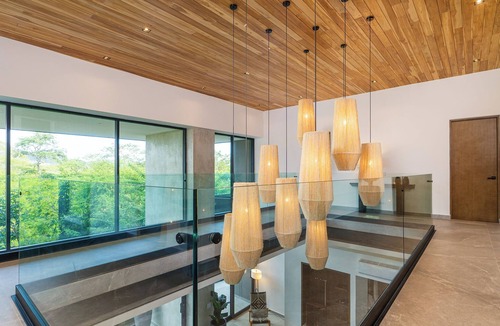 Tamarindo House | Spacious estate in enjoyable Playa Langosta with AC, fitness room, WiFi