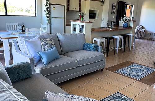 North Ward Apartment | Steps from The Strand 2BR & 2BA Riveria Retreat, Pool & Castle Hill Views