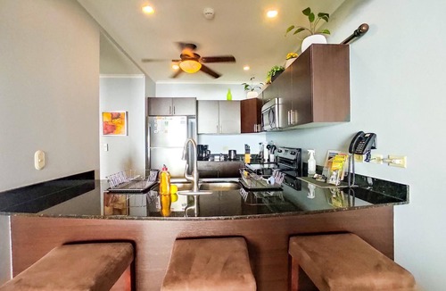Barrio Los Villalobos Apartment | The Palms Jaco 1001 penthouse on the beach