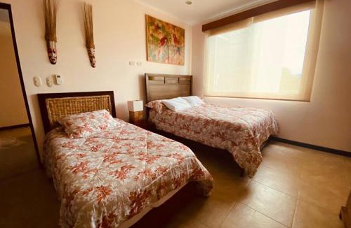 Barrio Los Villalobos Apartment | The Palms Oceanfront Condo 604