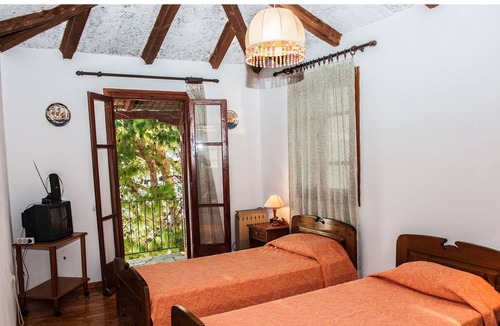 Paleros Villa | Traditional, rustic, seafront villa, just steps away from the beach.