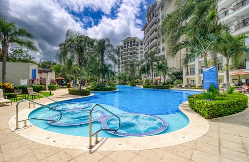 Barrio Santa Lucia Apartment | Upscale, Modern Condo with Ocean Views, Shared Pool, and WiFI