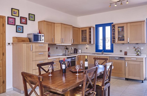 Pefkos Villa | Villa for six. Large pool, sea views, lawned gardens. Near beach and amenities.
