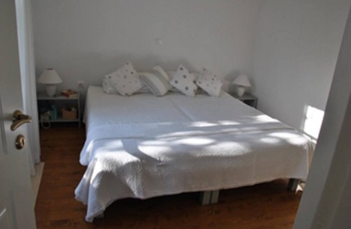 Kioni House | Zaros House. Two bed traditional renovated house with sea views in Kioni.