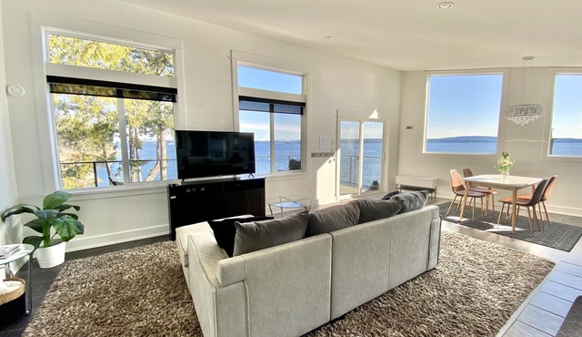 Waterfront suite with large deck and private hot tub