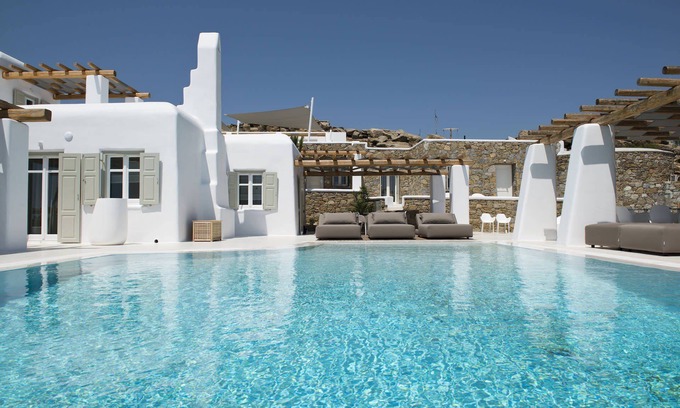 Tourlos Villa | My Rental Homes - Villa Opallia with spacious living and dining areas and a pool