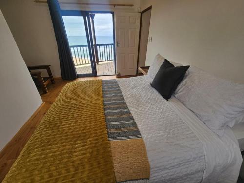 Ifafa Beach House | Oceanview Wooden Cottage