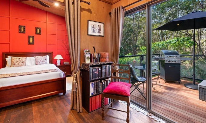 Tinbeerwah Resort | Orchid villa is decorated in Asian inspired décor with timber throughout